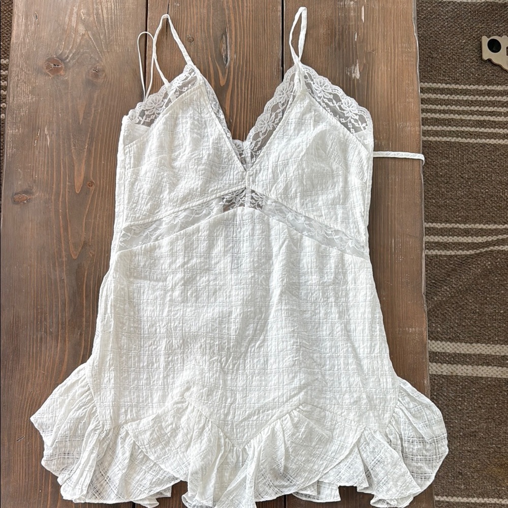 Elegant White Lace Trimmed dress